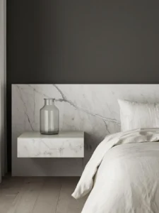 bedroom featuring a solid travertine nightstand