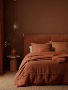master bedroom styled in a monochromatic clay