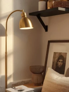 A close-up editorial vignette of a small apartment living room