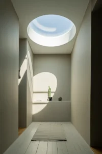 A once-dark hallway now bathed in bright natural light