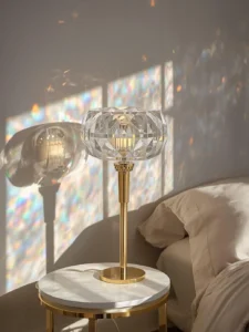 A sculptural table lamp with a large precision