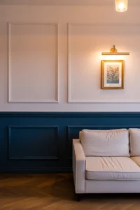 a family room wall featuring chair rail molding