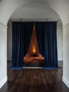 bedroom with ceiling-mounted curtain tracks