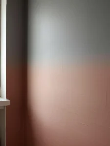 close-up wide shot of a bedroom feature wall with hand-applied limewash