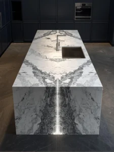 dramatic kitchen island with a perfectly book-matched quartzite slab