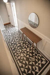 entryway hallway with a dramatic black and white geometric encaustic tile