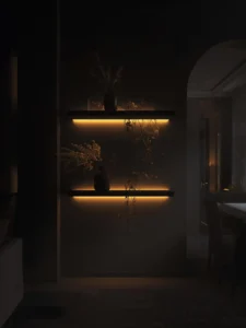 floating shelves fitted with warm amber LED underlighting