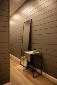 hallway with floor-to-ceiling horizontal shiplap painted in warm greige