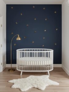 nursery with a single deep midnight blue matte accent wall serving as the crib backdrop