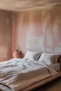 plaster pink limewash textured walls with visible brush strokes and tonal variation