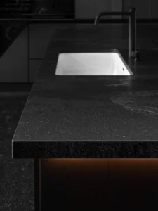 sleek black kitchen with a honed matte black granite countertop