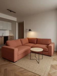 studio apartment open-plan space with a small-scale L-shaped modular sofa