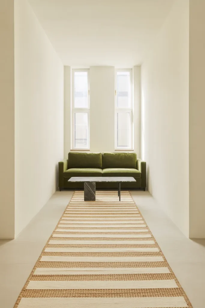 modern living room with a long cream and natural cotton striped runner rug