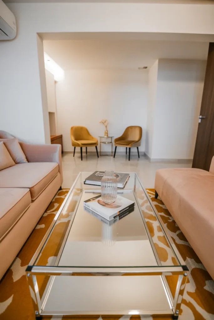 A Lucite or Acrylic Coffee Table That Makes Furniture Almost Disappear in a Small Room