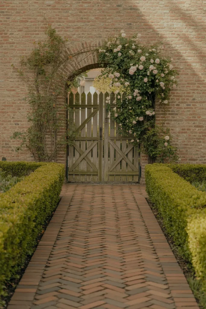 Brick Herringbone Path Leading to a Back Garden Gate