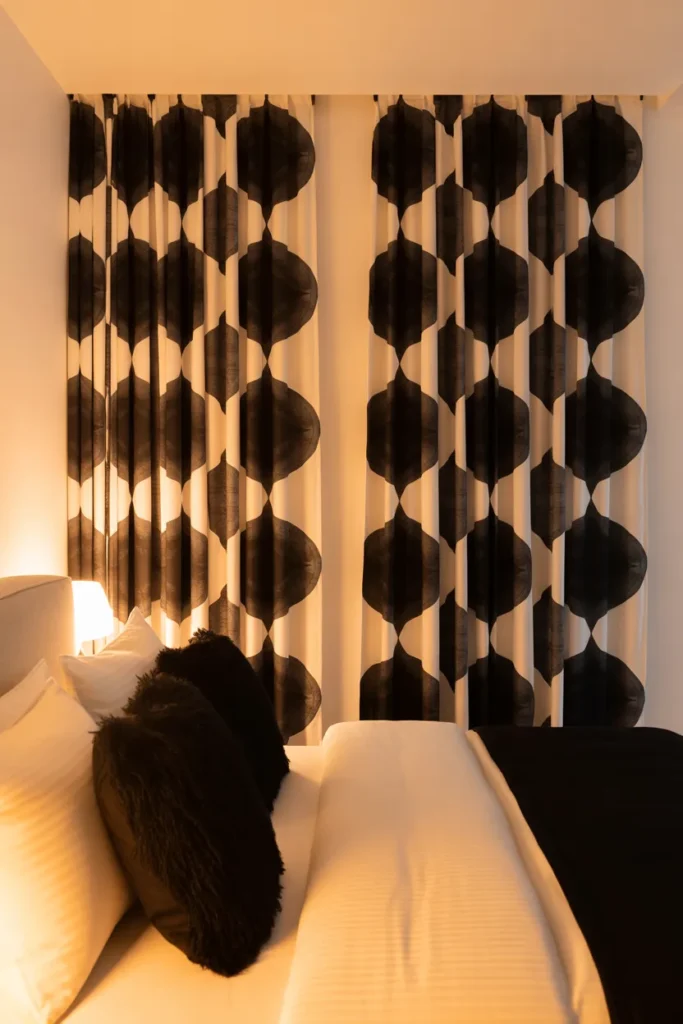 Patterned Blackout Curtains as the Bedroom Focal Point